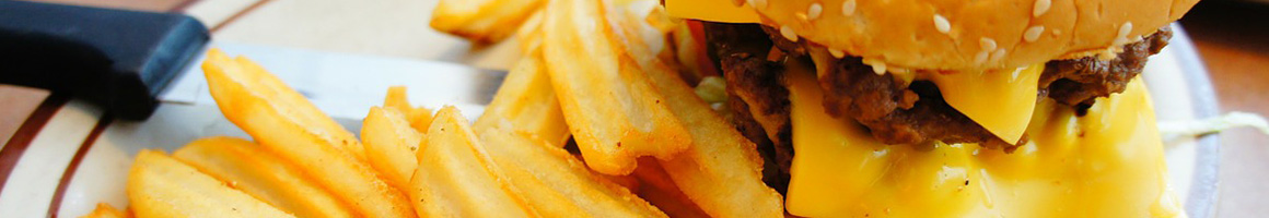 Eating Burger at JCW's The Burger Boys restaurant in South Jordan, UT.